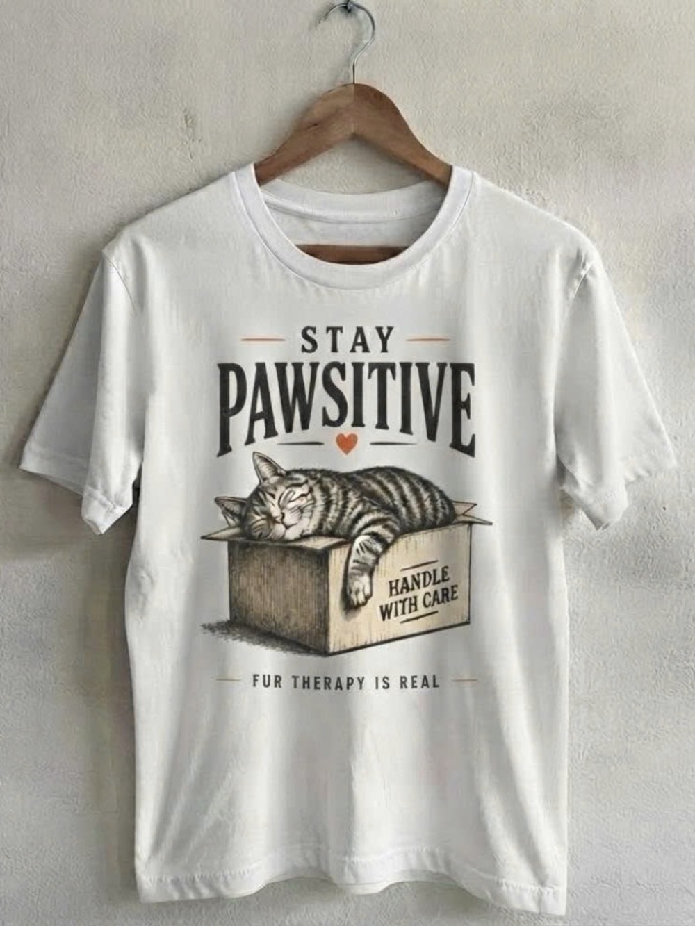 Stay Pawsitive White Cat T-Shirt - Relaxing Tabby Design